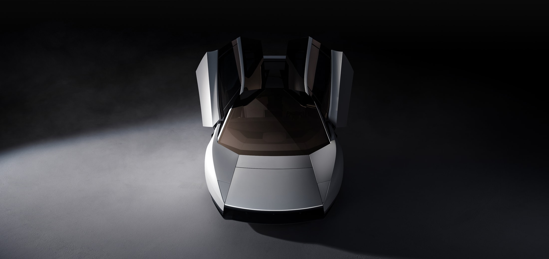 テスラ 新型ロードスターをドアを開けた状態で上から見た外観